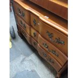 A continental style chest of three drawers Catalogue only, live bidding available via our website.