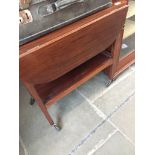 A mahogany drop leaf trolley Catalogue only, live bidding available via our website. If you