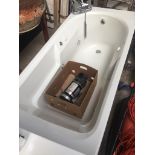 A spa bath with chrome modern taps and pump underneath Catalogue only, live bidding available via