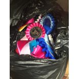 A bag of rosettes Catalogue only, live bidding available via our website. If you require P&P