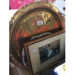 A large brass charger, a pottery tray and a picture. Catalogue only, live bidding available via