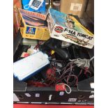 A box of model kits, game controllers, model railway track, etc. Catalogue only, live bidding