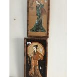 A pair of Japanese style hand painted majolica tiles in bamboo style wooden frames, 40cm x 20cm each