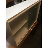 A glass sliding bathroom cabinet Catalogue only, live bidding available via our website. If you
