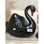 A ceramic black swan Catalogue only, live bidding available via our website. If you require P&P