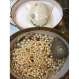 A tub of pearl necklaces etc Catalogue only, live bidding available via our website. If you