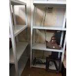A pair of open metal storage shelves Catalogue only, live bidding available via our website. If
