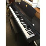A casio Celviano AP-45 electric piano and stool Catalogue only, live bidding available via our