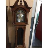 A modern reproduction westminster chime long case clock Catalogue only, live bidding available via
