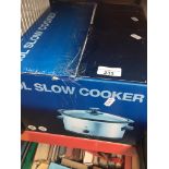 A boxed 3L slow cooker Catalogue only, live bidding available via our website. If you require P&P
