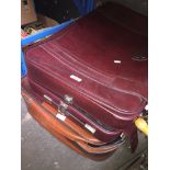 Two suitcases with satchels, pictures, etc Catalogue only, live bidding available via our website.