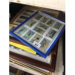 A collection of framed cigarette cards - aviation, ships and railway interest Catalogue only, live
