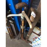 A bundle of walking sticks Catalogue only, live bidding available via our website. If you require
