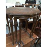 A cabriole leg nest of tables with burr wood tops Catalogue only, live bidding available via our