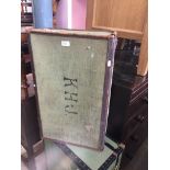 A vintage leather bound travel trunk in green Catalogue only, live bidding available via our