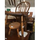 An elm seated spindle back chair and a small stool Catalogue only, live bidding available via our