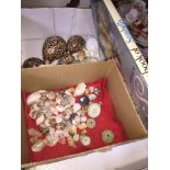 A box of sea shells and a book Catalogue only, live bidding available via our website. Please note