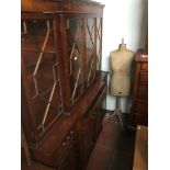 A reproduction mahogany breakfront cabinet bookcase with secretaire drawer Catalogue only, live
