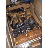 A box of ethnic wooden carvings Catalogue only, live bidding available via our website. Please
