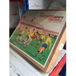 A boxed magnetic football game Catalogue only, live bidding available via our website. Please note