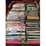 A box of DVDs and CDs Catalogue only, live bidding available via our website. Please note we can