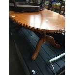 Oval light wood coffee table Catalogue only, live bidding available via our website. Please note