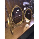 A French style gilded triple dressing table mirror Catalogue only, live bidding available via our