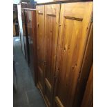 Modern pine three door wardrobe Catalogue only, live bidding available via our website. Please