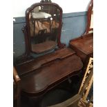 A Victorian mahogany dressing table with swing mirror Catalogue only, live bidding available via our