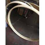 Pair of circular cream frame retro mirrors Catalogue only, live bidding available via our website.