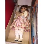 A boxed porcelain doll - Knitsbridge collection. Catalogue only, live bidding available via our