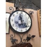 Wine themed metal clock. Catalogue only, live bidding available via our website. Please note we