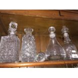 Four glass decanters Catalogue only, live bidding available via our website. Please note we can only