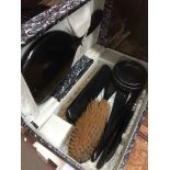 A cased ebonised wood vanity set Catalogue only, live bidding available via our website. Please note
