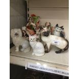 Cat ornaments, Staffordshire figures etc Catalogue only, live bidding available via our website.