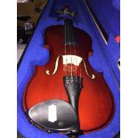 A cased 1/2 size violin and bow. Catalogue only, live bidding available via our website. Please note