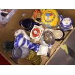 Box of ceramics inc. coloured teapots etc. Catalogue only, live bidding available via our website.