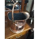A copper coal bucket Catalogue only, live bidding available via our website. Please note we can only