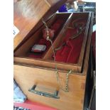 A multileveled sewing box with few contents. Catalogue only, live bidding available via our website.