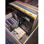 A box of vinyl LPs and CDs Catalogue only, live bidding available via our website. Please note we