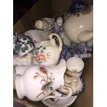 A box of pottery jugs, candle holders, etc. Catalogue only, live bidding available via our