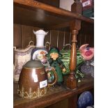 Five pieces of mixed pottery including a Merkelbach tankard, an Italian vessel formed as a pig