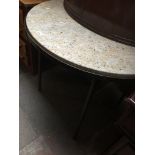 Circular metal table with marble top Catalogue only, live bidding available via our website.