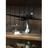 Two model aeroplanes on stands Catalogue only, live bidding available via our website. Please note
