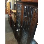 Leaded glass oak display cabinet Catalogue only, live bidding available via our website. Please note