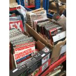 A collection of over 300 Manchester United home programmes and extras - 2 boxes. Catalogue only,