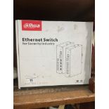 A boxed Alhua PoE ethernet switch for security industry. Catalogue only, live bidding available