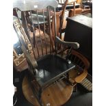 A spindle back rocker Catalogue only, live bidding available via our website. Please note we can