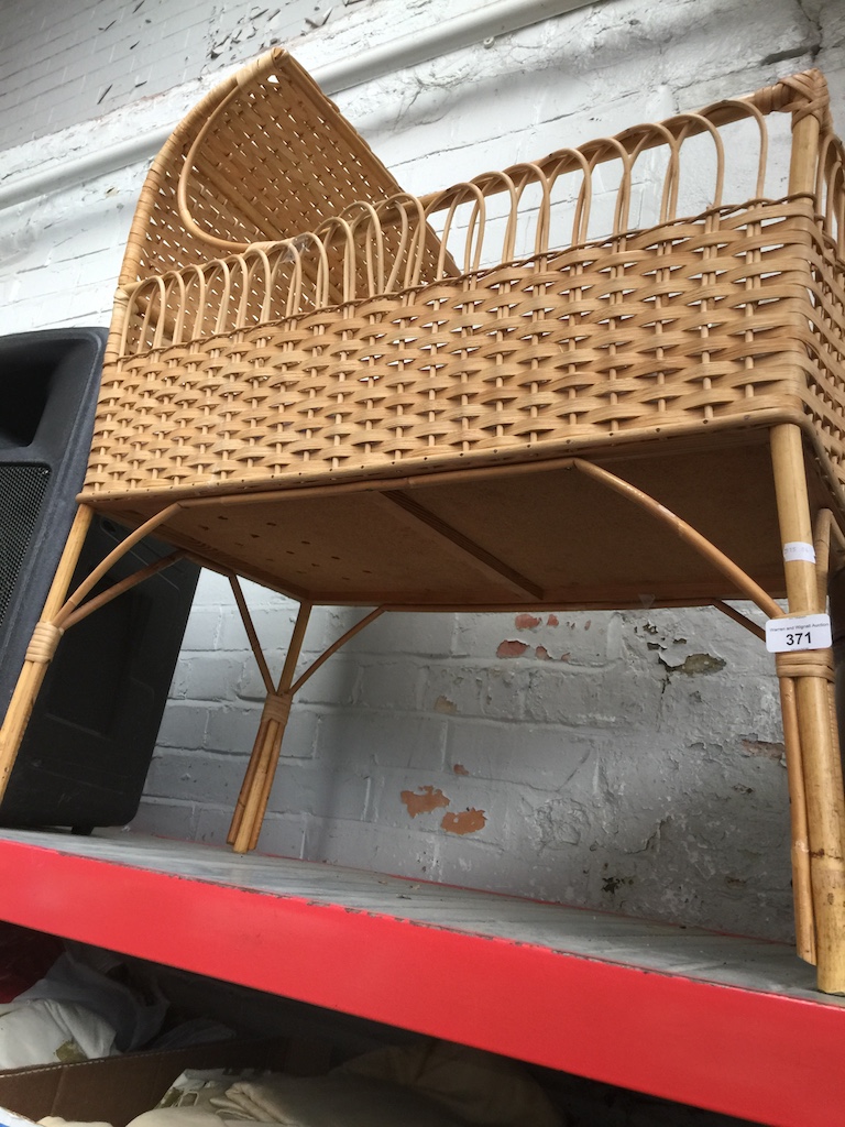 A wicker crib with mattress, drapes etc Catalogue only, live bidding available via our website.