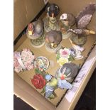 A box containing bird figures and ceamic posies Catalogue only, live bidding available via our